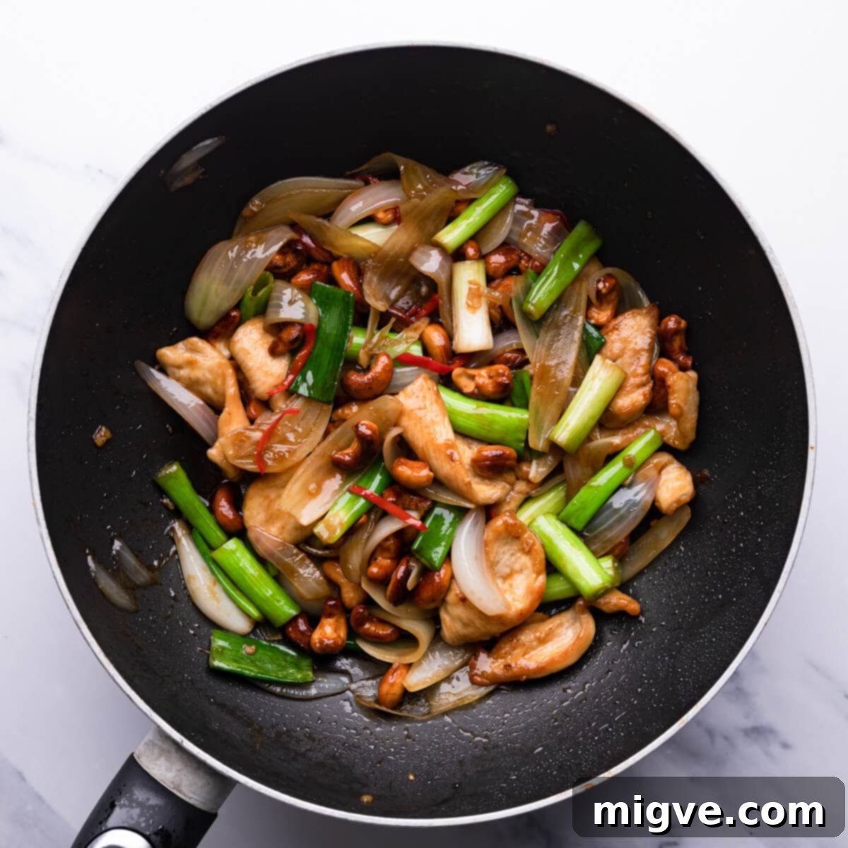 Crunchy Cashew Thai Chicken 9 top down view of the cashew chicken in a wok pan