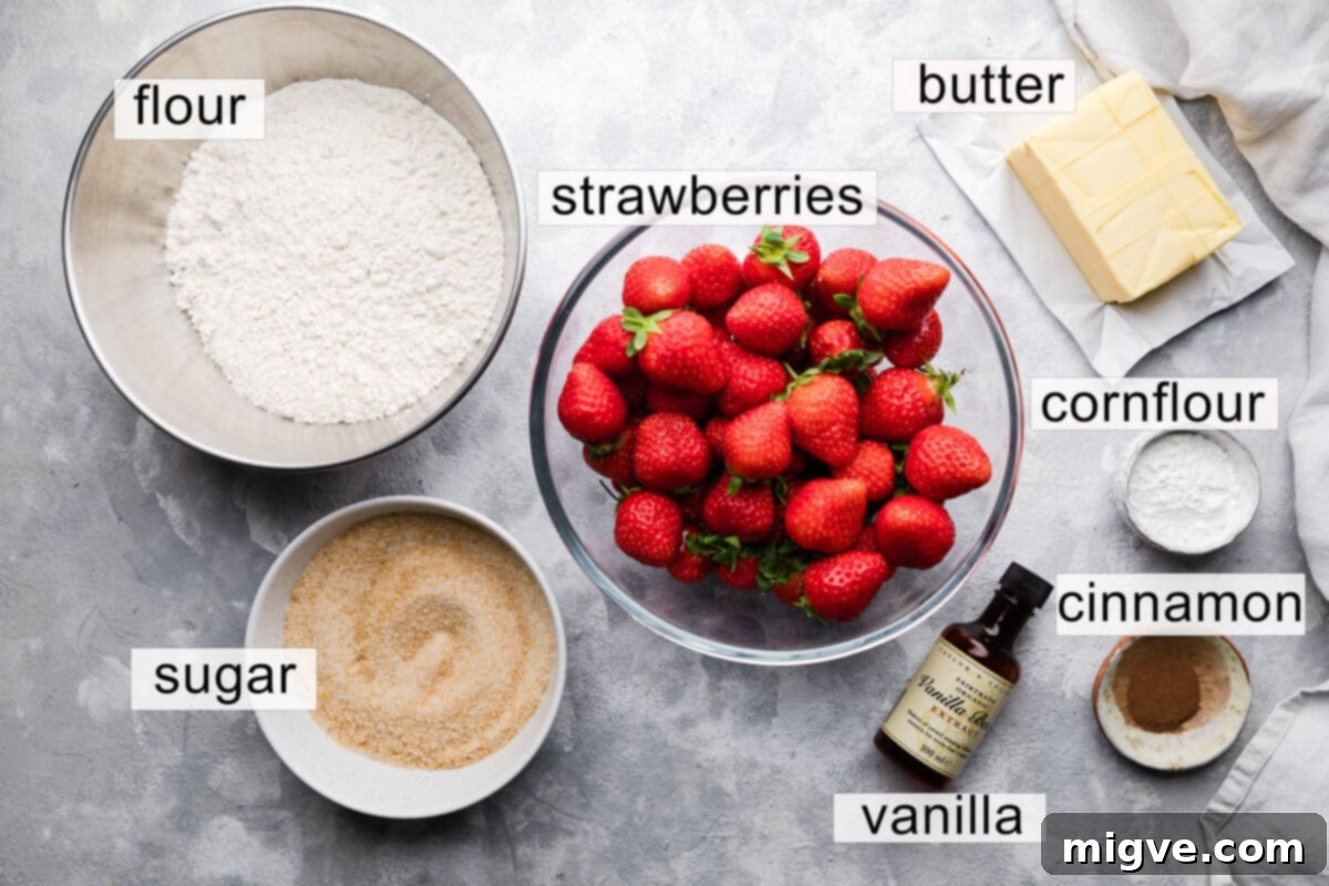top down photo of the ingredients for strawberry crumble with text labels