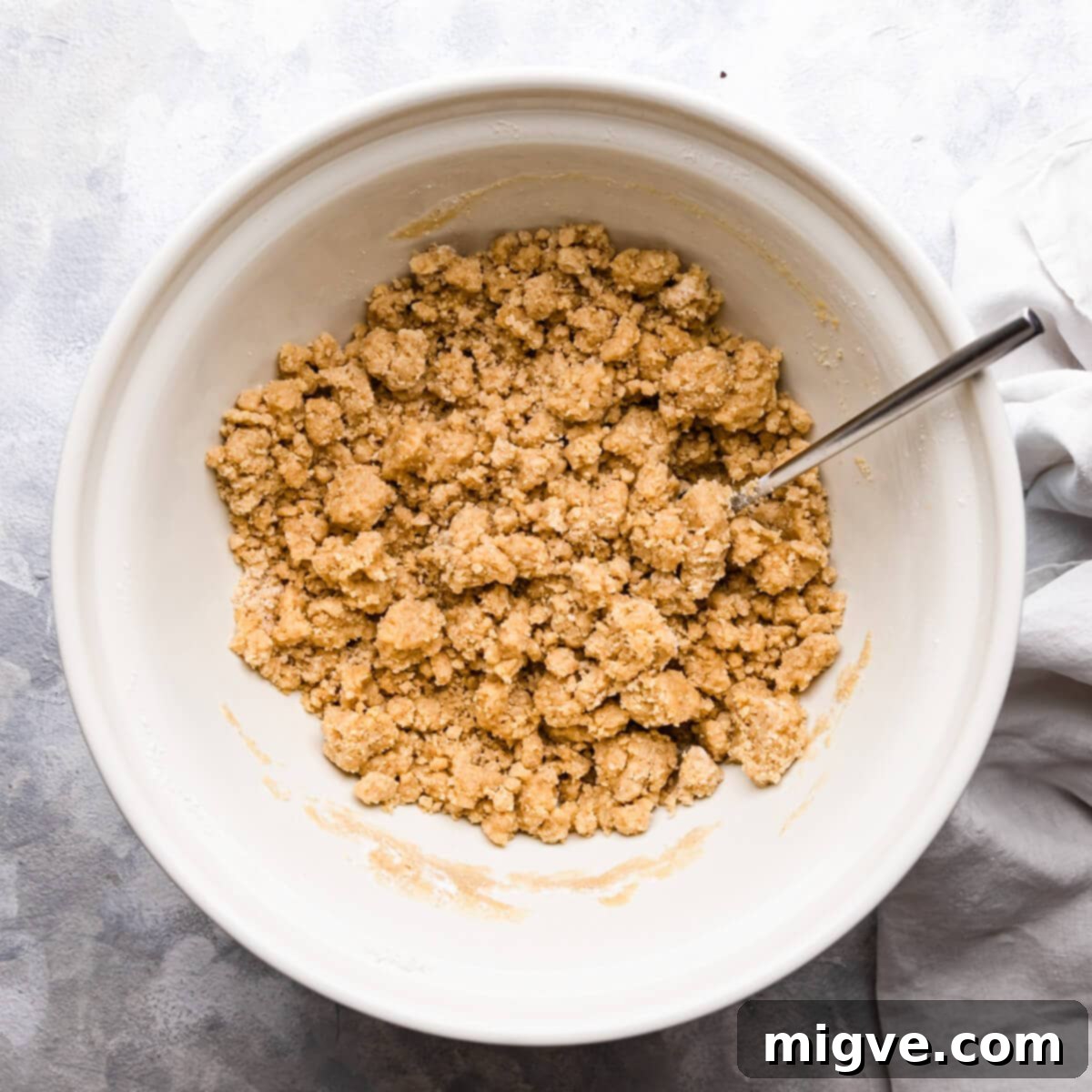 overhead photo of a crumble mixture in a bowl