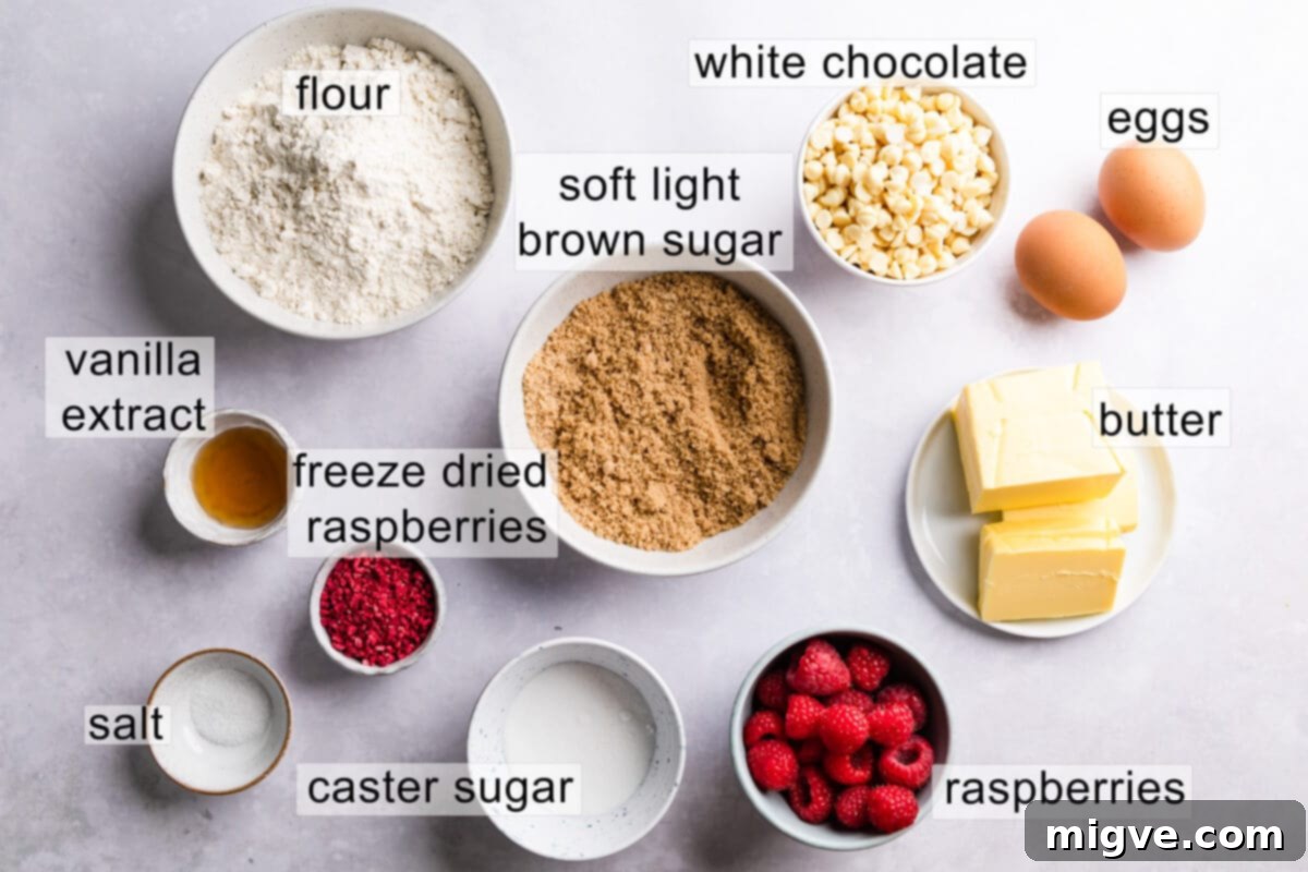 A collection of ingredients laid out for making white chocolate and raspberry blondies, each with a clear label.