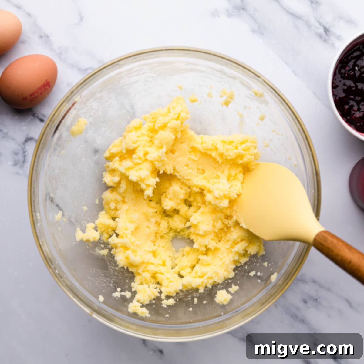 Decadent Raspberry Chocolate Cupcakes 4 glass bowl with creamed butter and sugar, light and fluffy.