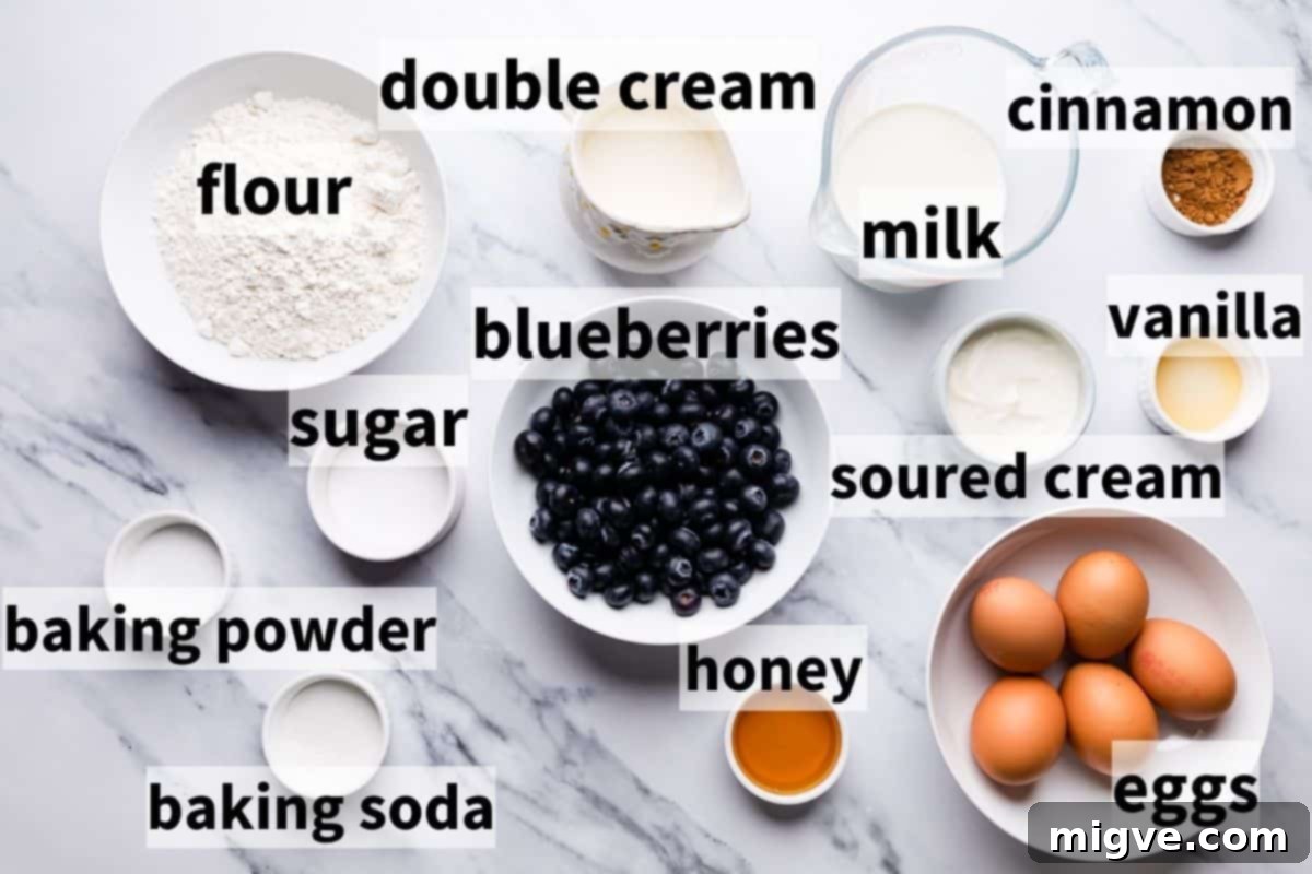 Baked Blueberry Pancake Bliss 3 Bowls with ingredients for pancake pudding with blueberries, including flour, sugar, eggs, and cream.