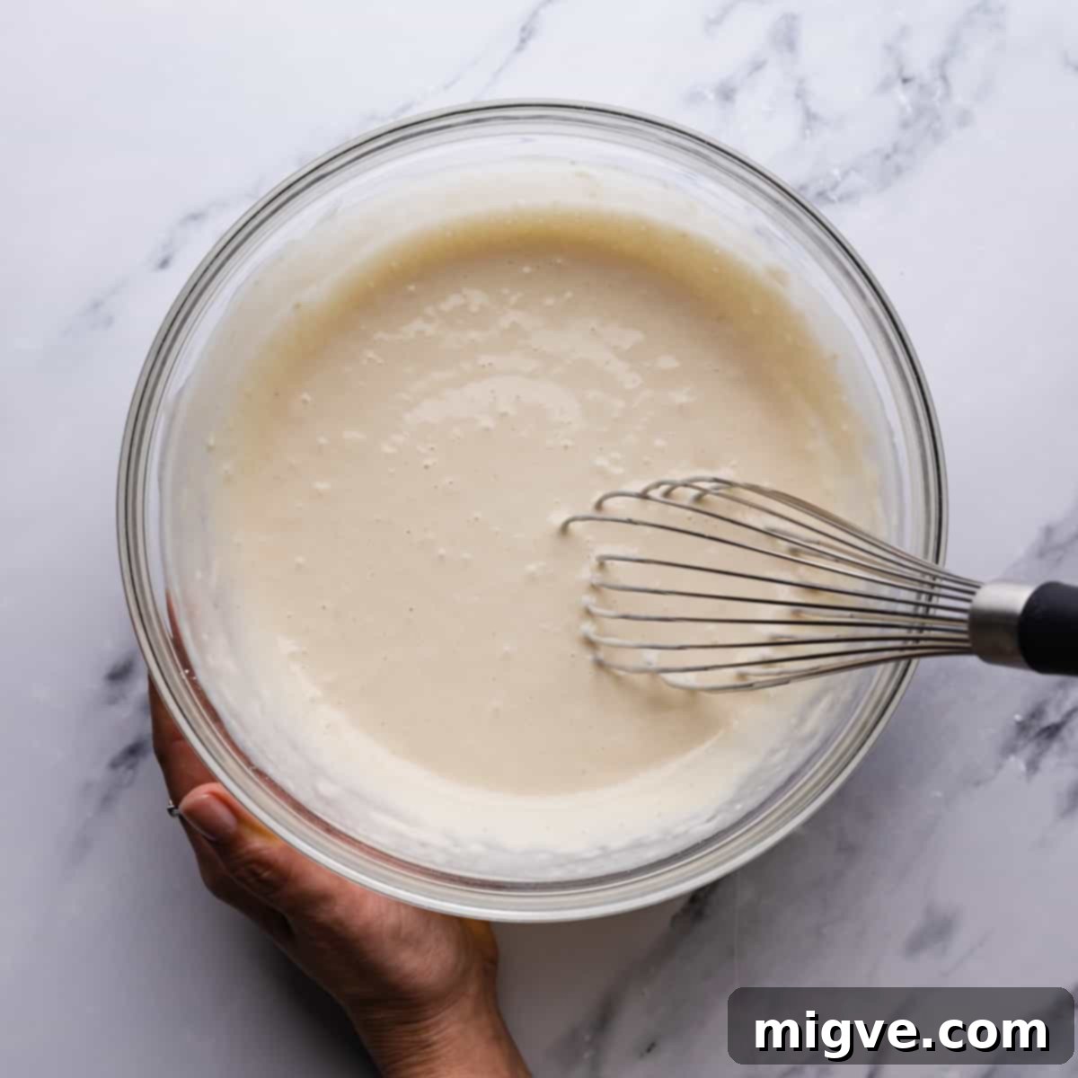 Baked Blueberry Pancake Bliss 4 Large bowl with smooth pancake batter inside, ready for cooking.
