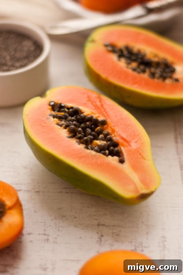 Mango and Papaya Chia Pudding with Apricot - a delightful and healthy breakfast option.