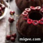 A delicious slice of Vegan Cherry Chocolate Bundt Cake.