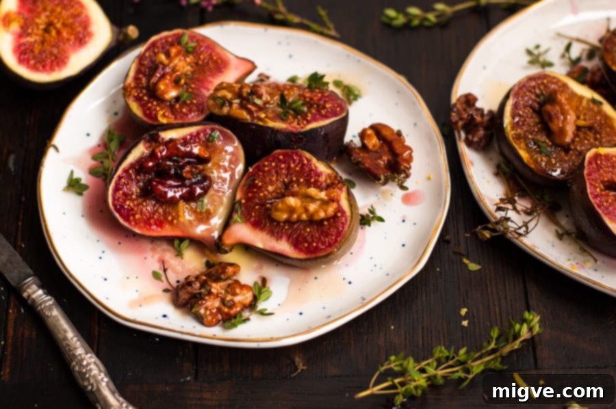 Platter of warm baked figs, ready to be served as a delightful and healthy fall appetizer. | via@ annabanana.co