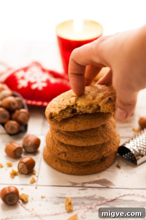 Nutmeg Cookies with Chocolate and Hazelnuts on a cooling rack