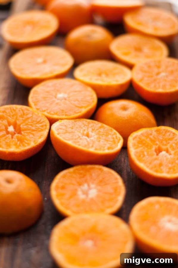 Zesty Clementine and Cranberry Cordial 4 Clementine and Cranberry Cordial being poured into a glass