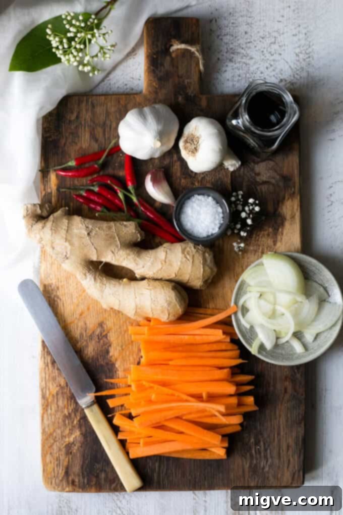 Close-up of a refreshing Quinoa Stir Fry featuring mixed vegetables, golden cashew nuts, and a bright, citrusy dressing.