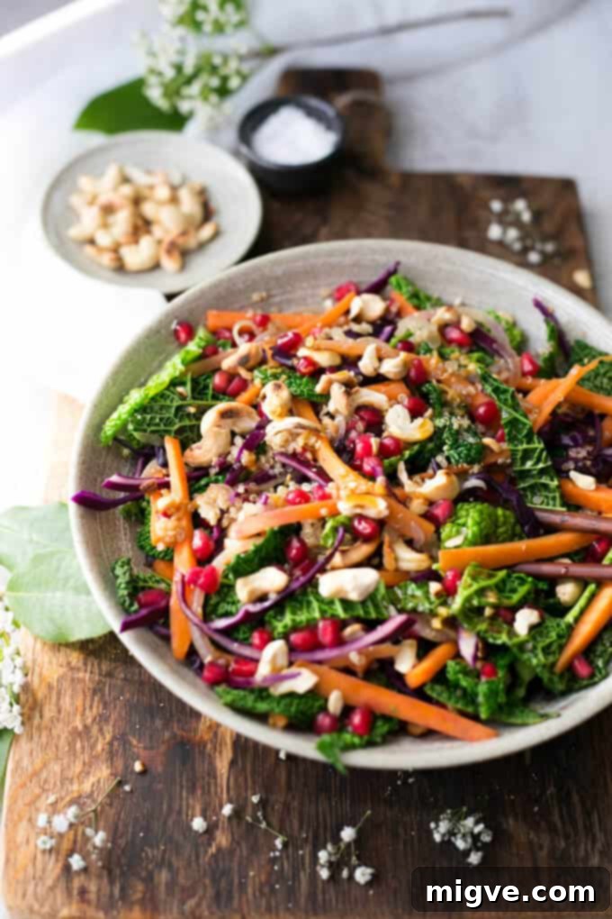 A close-up of the delicious Quinoa Stir Fry, garnished with fresh pomegranate seeds for an extra touch of color and sweetness.