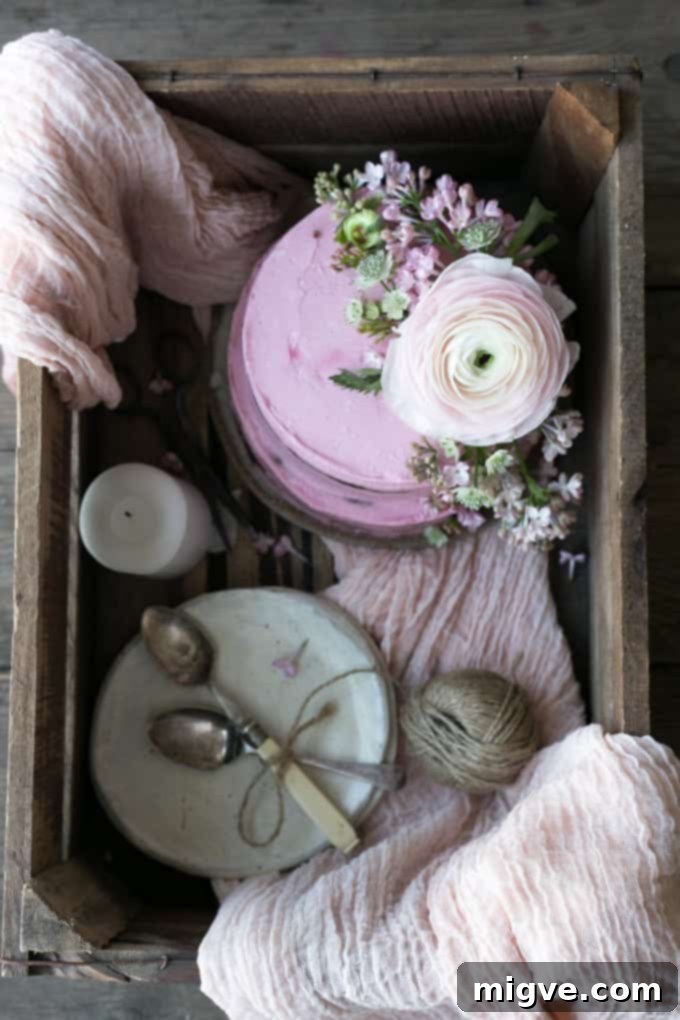 Chocolate cake with pink frosting, photographed during a creative photography workshop session