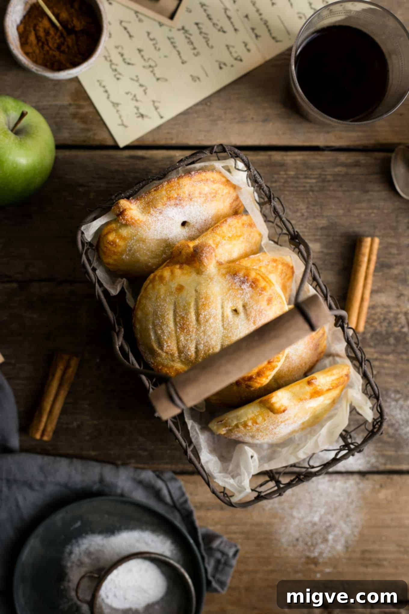 Warm Spiced Apple Pumpkin Pockets 2 Homemade vegan spiced apple and pumpkin mini-pies, perfect for autumn desserts or Halloween treats.