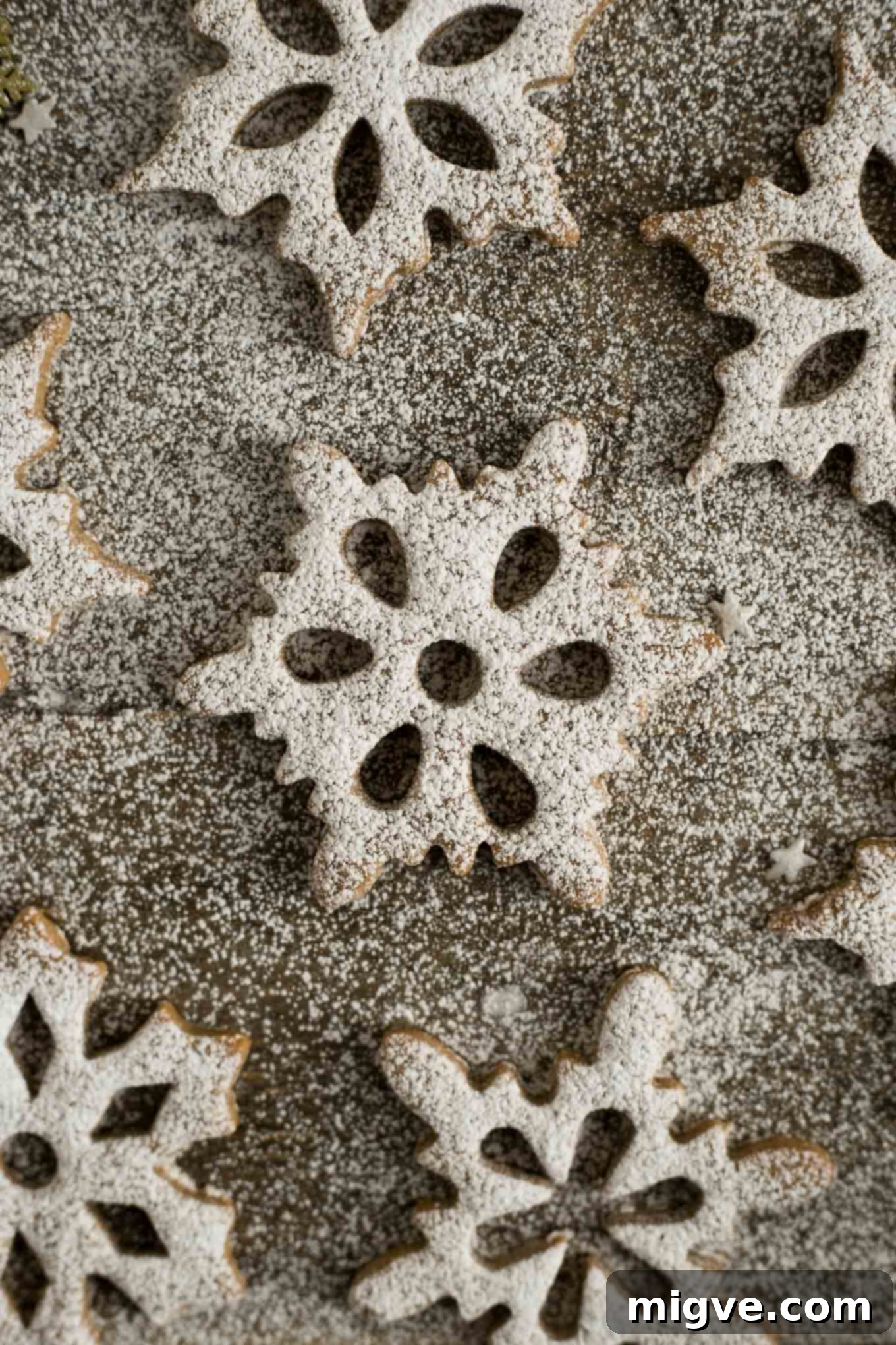 Frosted Cinnamon and Maple Snowflake Cookies 4 Totally delicious cinnamon & maple snowflake cookies! They are also great for decorating your Christmas tree with, or as a edible gift for the loved ones! #cookies #cinnamon #vegan #Christmas | via @annabanana.co