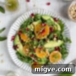 Super-clean avocado and clementine salad with juicy pomegranate