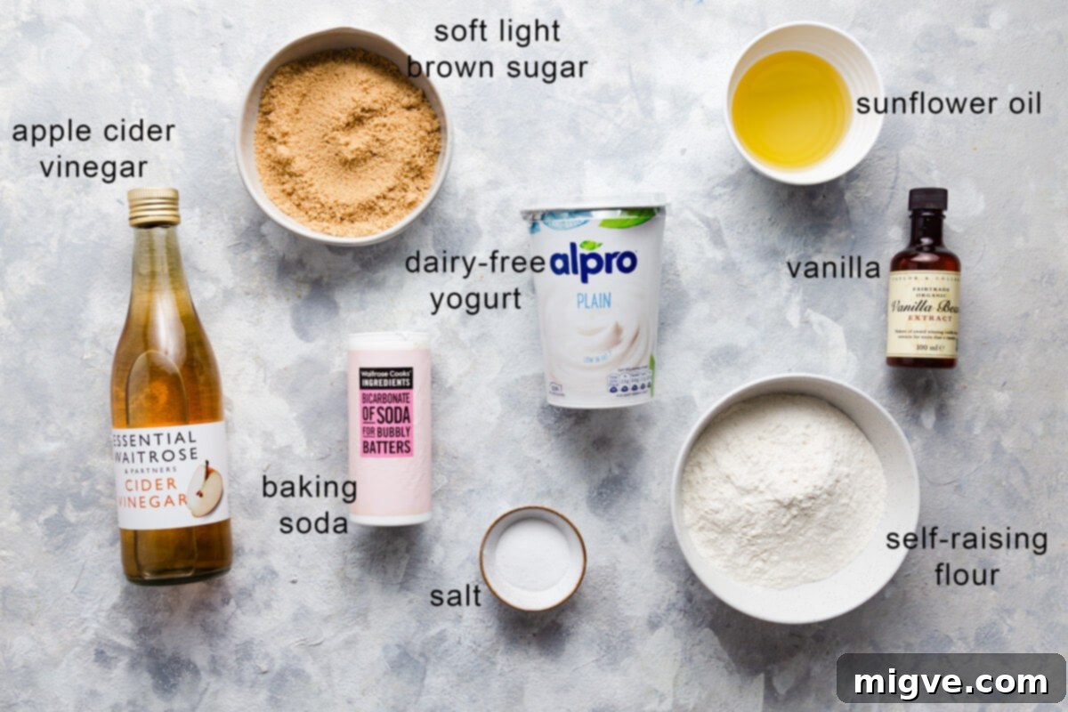 Top-down view of ingredients for vegan cupcake sponge, clearly labeled for easy preparation.